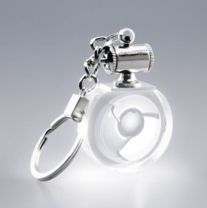 Porte-clefs rond lumineux avec logo blanc