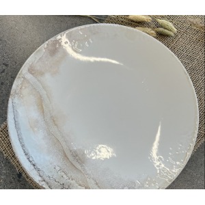 Assiette marbrée en grès